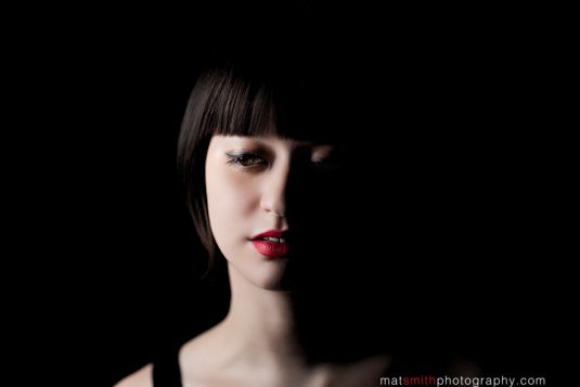 Maja Bodenstein, scriptwriter, portrait on black by Mat Smith Photography