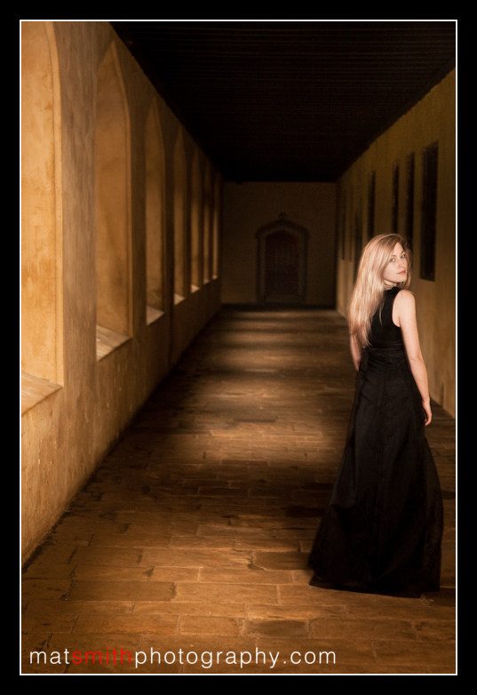Ceri, pianist, in the cloisters, portrait by Mat Smith Photography, Magdalen College, Oxford