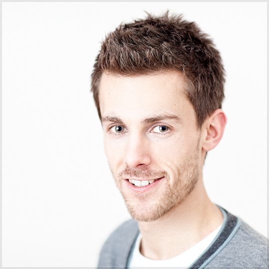 Tom Graham, actor who plays Tom Archer in The Archers, portrait by Mat Smith Photography at home