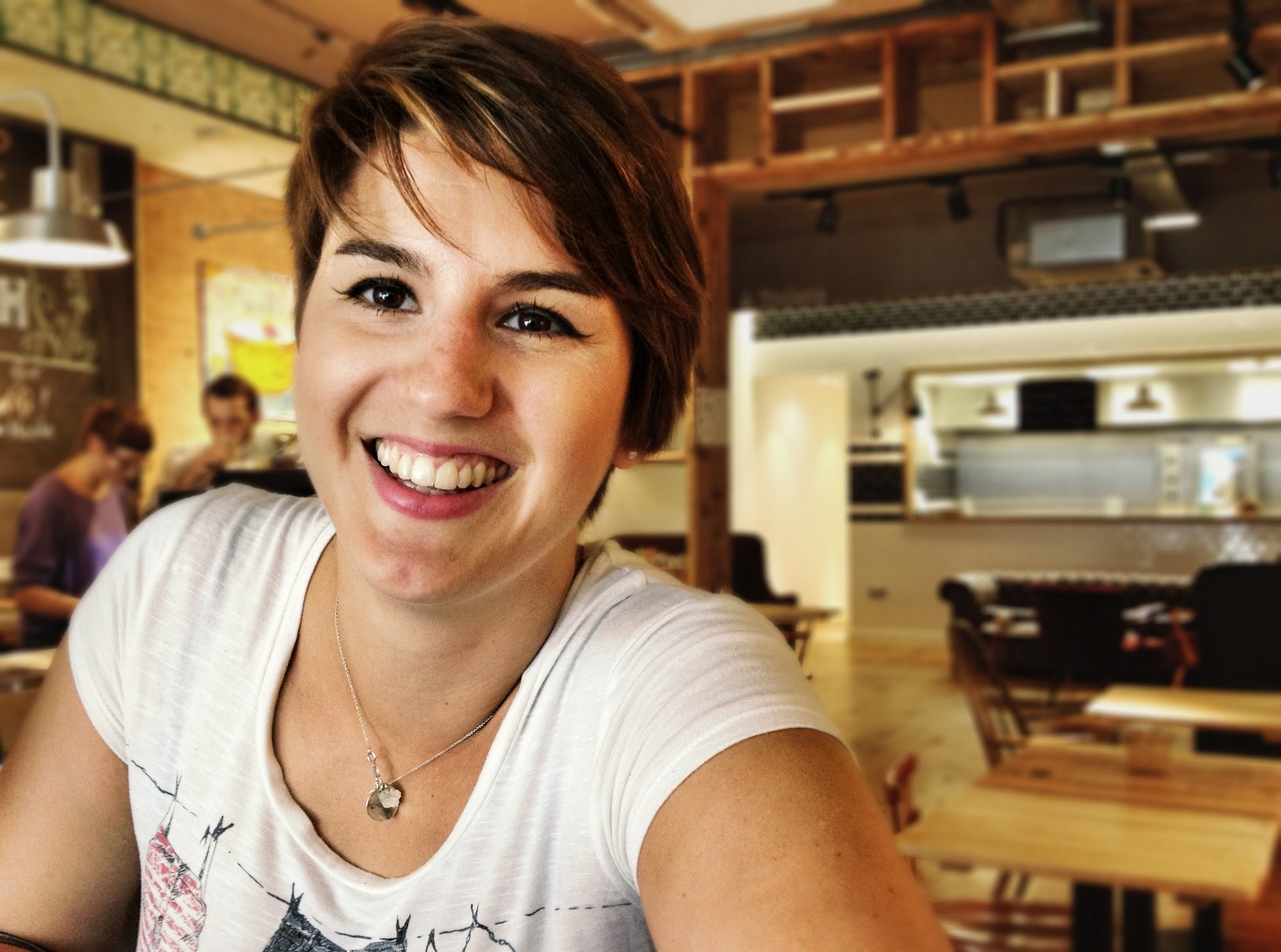 Claire, iPhone portrait by Mat Smith Photography in a coffee house, Amersham