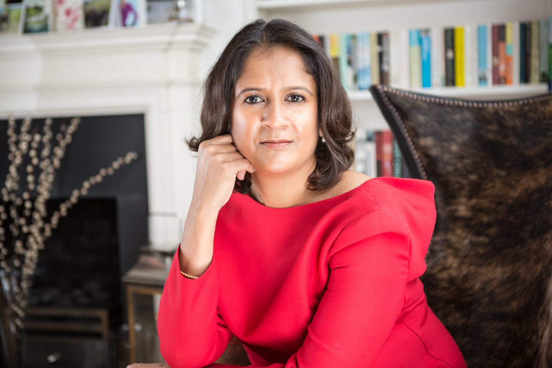Toto James, Woman of the Year nominee, on a sofa at home, portrait by Mat Smith Photography