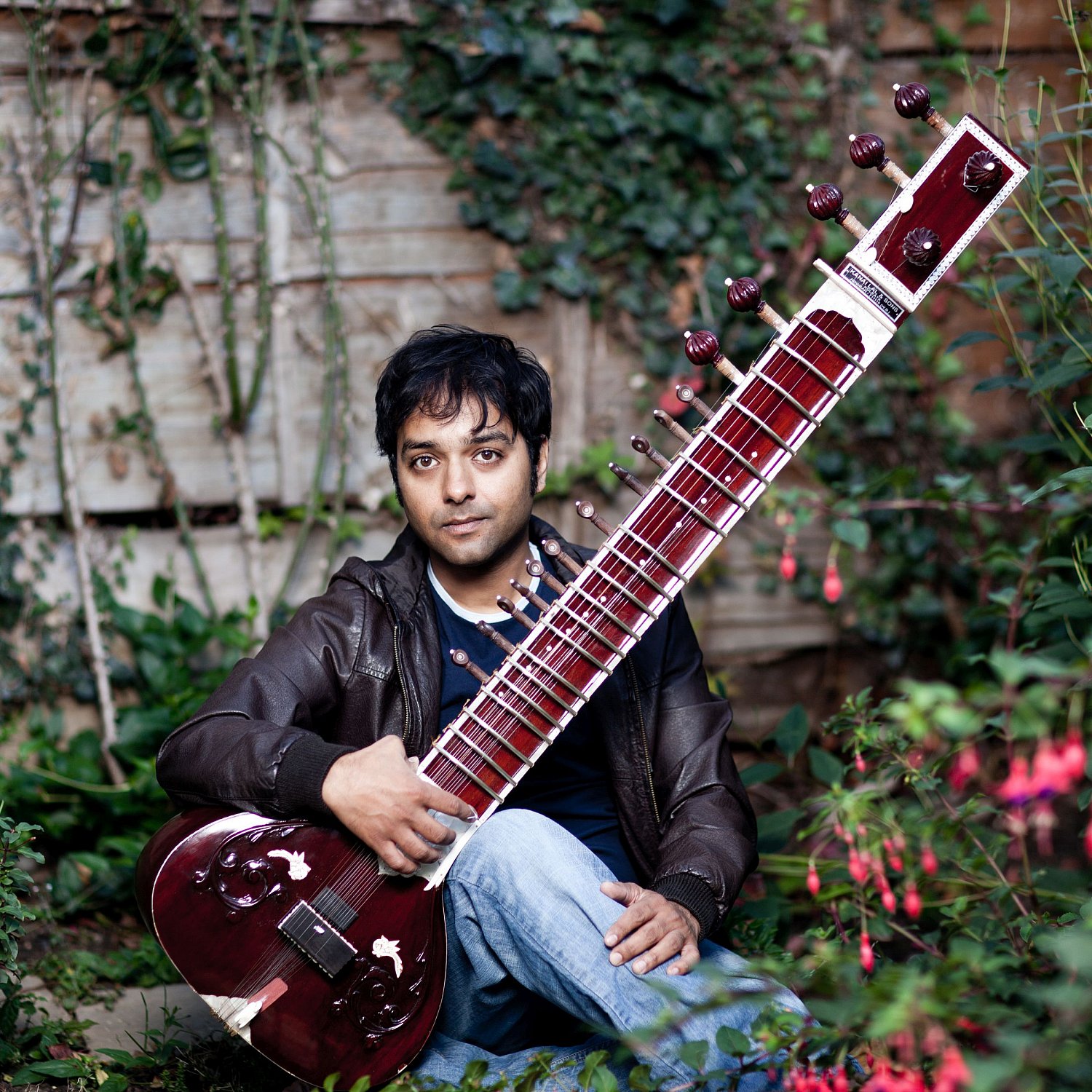 Sitar player outdoors, photographed for BASCA magazine